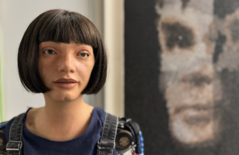 'AI God' portrait of Alan Turing by Aida humanoid robot